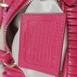 Pink/red coach purse